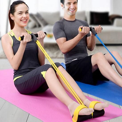 Two people exercising with resistance bands on a pink mat in a home setting.